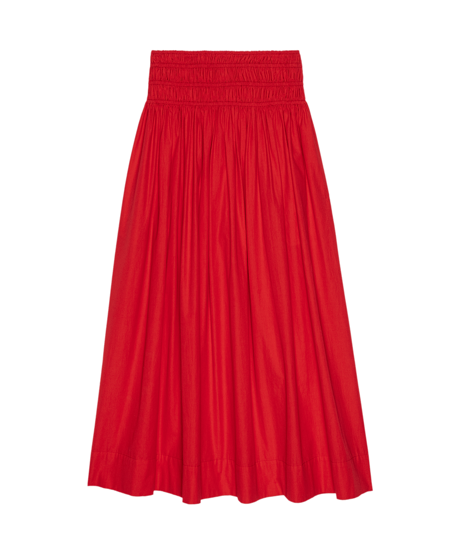 The Viola Skirt by THE GREAT. SU25—Hot Red, knee-length, gathered with an elastic waistband—is a must-have women’s fashion piece, shown on a plain background.