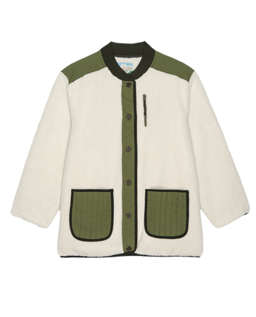 THE GREAT. F25 TGO The Plush Tundra Jacket in Cream & Army features vintage camp-inspired fleece, olive quilted accents, black trim, front buttons, multiple pockets—including a zippered chest pocket—shown on a white background.