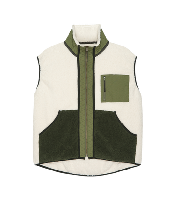 The Plush Tundra Vest by THE GREAT. F25 TGO features cream fleece with army green trim, zip front, two green front pockets, and a green zippered chest pocket—vintage camping inspired style in a modern design.