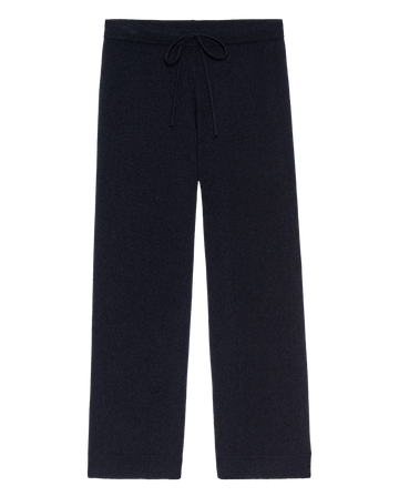 The Cashmere Lantern Pant in navy by THE GREAT. H25 CASHMERE features a wide-leg silhouette, elastic waistband, and drawstring—luxury loungewear designed for stylish relaxation.