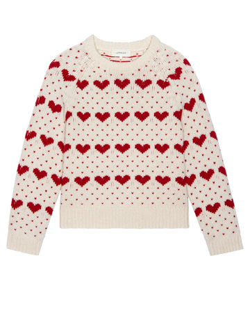 The Heart Crew. -- Pearl with Red by THE GREAT. PS26 is a vintage-inspired sweater featuring rows of red heart motifs across the front, sleeves, and neckline on a cream base.
