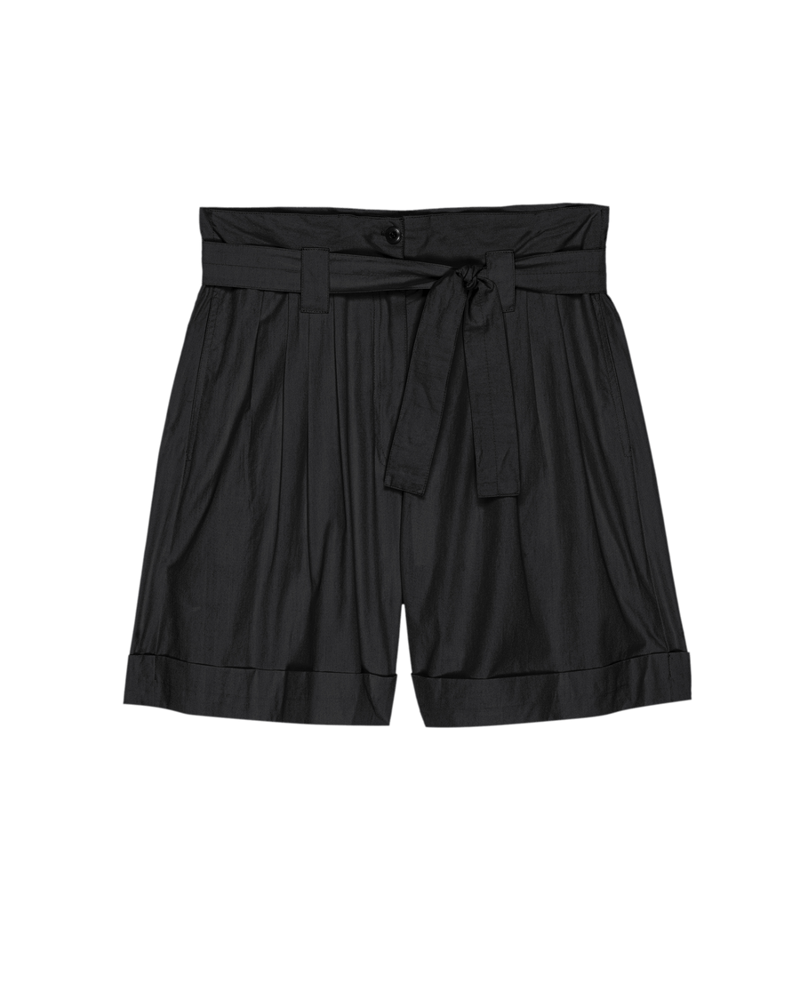 The Pleated Trouser Short in black from THE GREAT. SU25 features a high waist, pleats, fabric belt, button closure, and cuffed hems for a polished and versatile look.