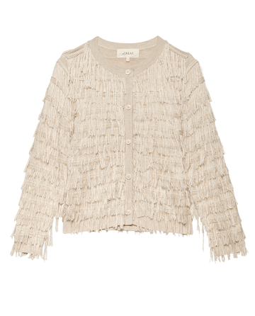 The Fringe Cardigan by THE GREAT. F25 D1 in Natural is a beige, long-sleeve cardigan made from soft viscose yarn with all-over fringe and a 1920s-inspired button-down front.