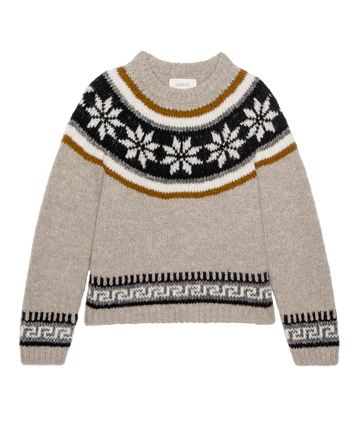 The Snowflake Fairisle Pullover in Oat from THE GREAT. H25 COLLECTION features a black, white, and mustard yellow snowflake fair isle yoke with geometric accents on the sleeves and hem.