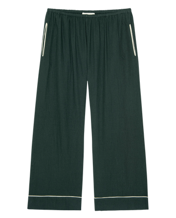The Flannel Western Easy Sleep Pant by THE GREAT. H25 SLEEP in Pine & Cream features a dark green flannel, wide-leg fit, elastic waistband, off-white piping on pockets and cuffs for relaxed comfort.