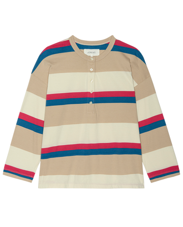 The Shrunken Henley. Novelty -- Study Hall Stripe by THE GREAT. PS26 features beige, cream, blue, and red yarn dye stripes with three front buttons, shown laid flat on a white background.