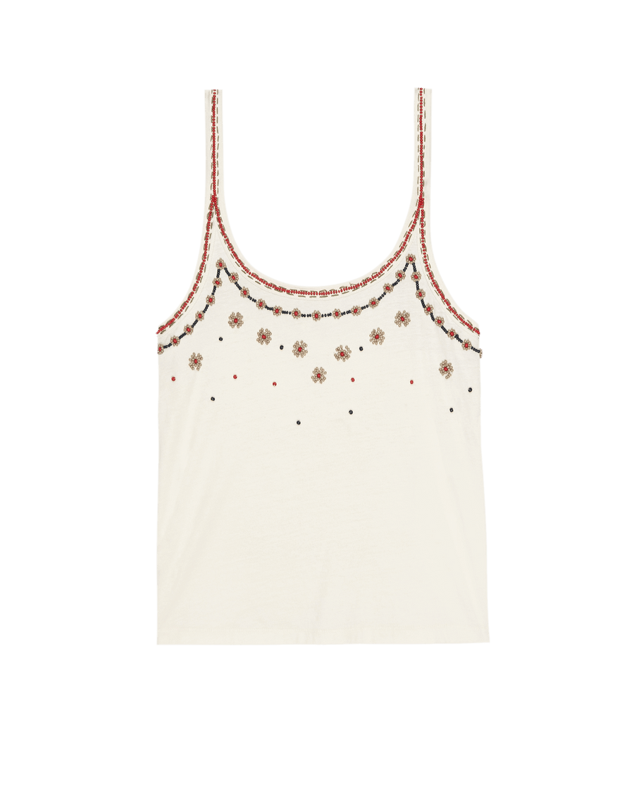 The Beaded Slim Tank by THE GREAT. SU25 in washed white features embroidered floral patterns and decorative red and brown stitching along the neckline and straps.