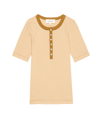 The Baseline Henley – Bronze Stripe by THE GREAT. PF25 is a short-sleeve beige and white striped shirt with a brown collar and button placket, ideal for men’s casual wear.