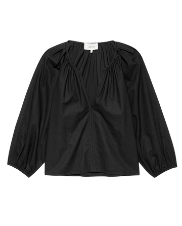 The Chariot Top in black by THE GREAT. F25 D2 is a textured cotton, long-sleeve v-neck with gathered shoulder details, shown on a white background.