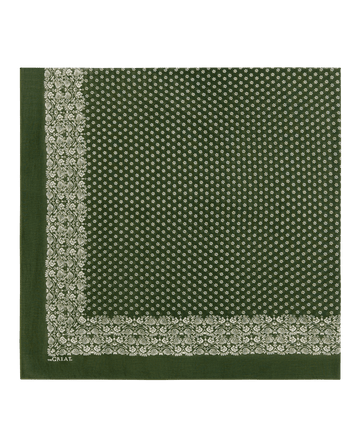 Sure! Here's a rewritten version using your product data: The Big Bandana in Army by THE GREAT. features an army green cotton fabric with a white floral border and small white dot pattern in the center; this oversized bandana is shown laid flat against a plain background.