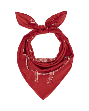 The Stetson Western Bandana in red by THE GREAT. STETSON SP26 features white printed patterns, folded and knotted, shown against a plain white background.