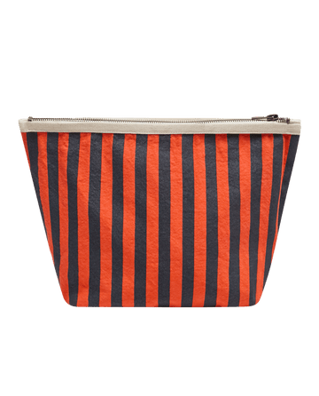 Introducing The Stripe Pouch—Hot Red Mini Prep Stripe by THE GREAT. F26 D1, a rectangular pouch showcasing bold vertical orange and black stripes, accented with a beige top edge and finished with a zipper closure, shown on a plain white background.