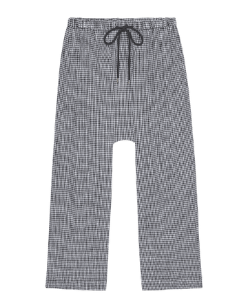 The Reef Pant in Black & Cream Check by THE GREAT. SP26 SWIM features a relaxed fit, elastic waistband, and drawstring, shown laid flat on a white background.