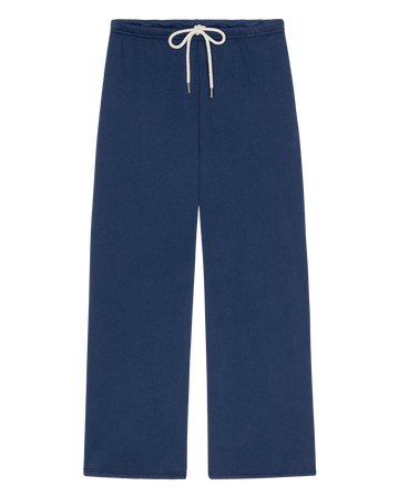 The Fleece Lap Sweatpant in True Navy featuring a wide-leg fleece design with an off-white drawstring at the elastic waistband.