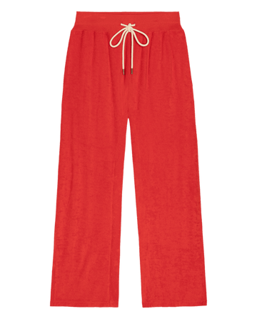 THE GREAT. SU26 The Micro Terry Horseshoe Sweatpant in Pimento features a bright red color, wide legs, an elastic waistband, and a beige drawstring tie, displayed on a white background.