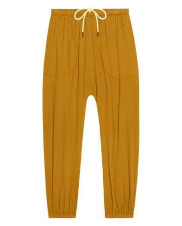 The Jersey Jogger Pant in Cork by THE GREAT. SU26 SEASONAL CORE features an elastic waistband with white drawstring, side pockets, and elastic ankle cuffs, shown laid flat on a white background.
