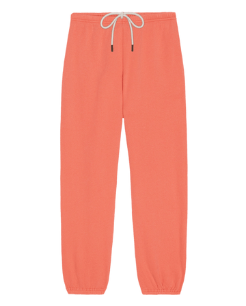 The Stadium Sweatpant. Solid -- Guava by THE GREAT. SU26 SEASONAL CORE features a coral hue, elastic waistband with white drawstring, and elastic cuffs—ideal for athletic wear or casual comfort—shown against a white background.