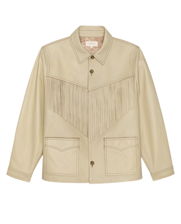The Leather Fringe Jacket in Toasted Almond by THE GREAT. SP26 D1 features beige leather, front fringe detail, button closure, pointed collar, and two front pockets.