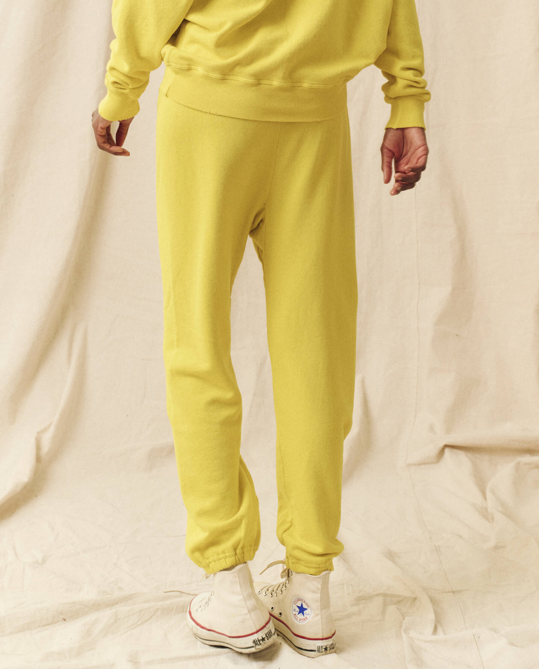The Stadium Sweatpant. Solid -- Sunbeam SWEATPANTS THE GREAT. SP24 KNITS