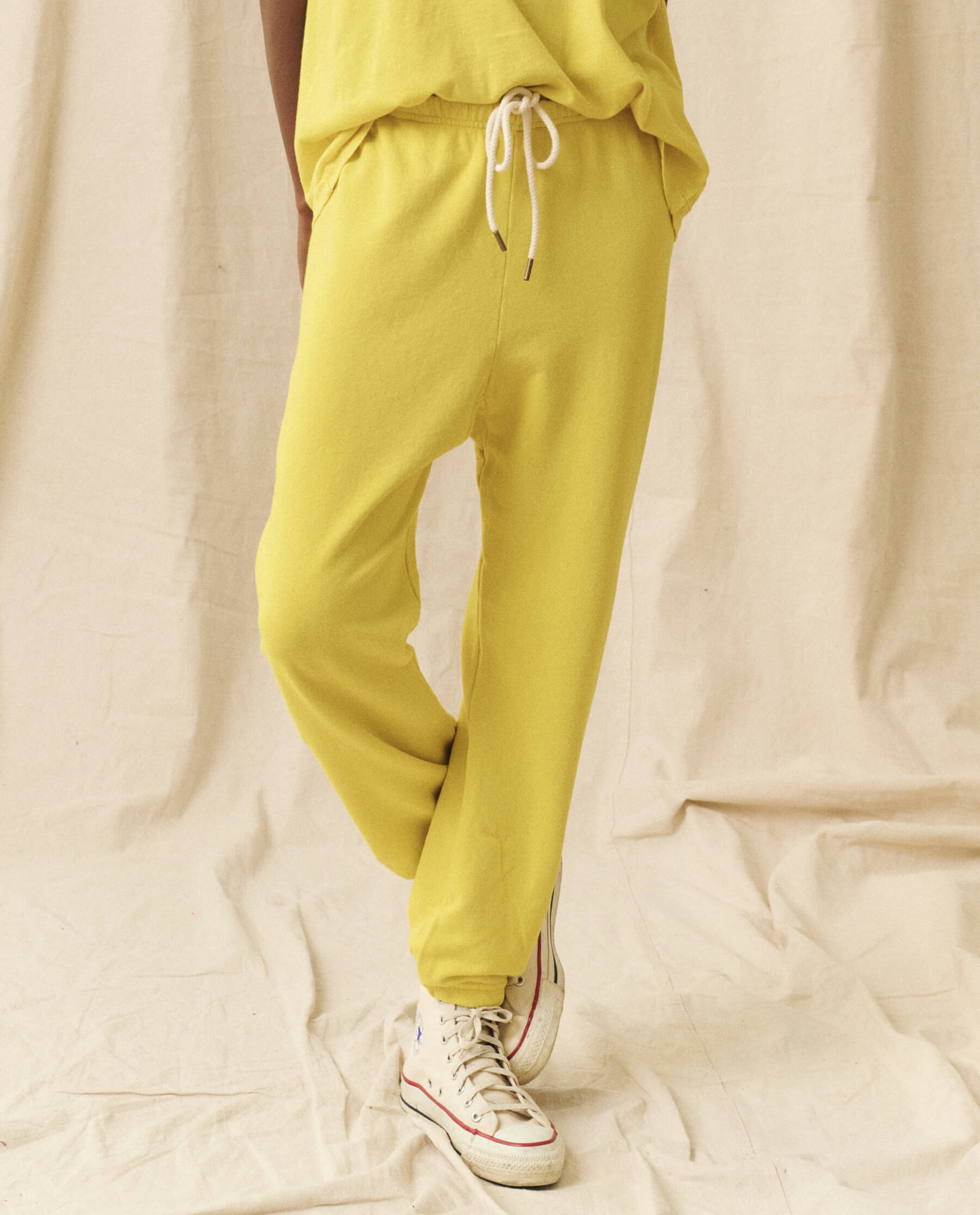 The Stadium Sweatpant. Solid -- Sunbeam SWEATPANTS THE GREAT. SP24 KNITS