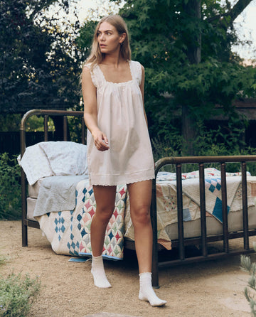 The Eyelet Mini Tank Dress. -- True White The Great. The Eyelet Mini Tank Dress. -- True White The Great.