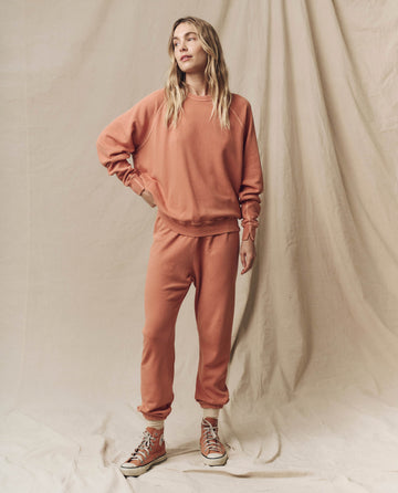 The College Sweatshirt. Solid -- Sun Dried Orange SWEATSHIRTS THE GREAT. SU24 KNITS
