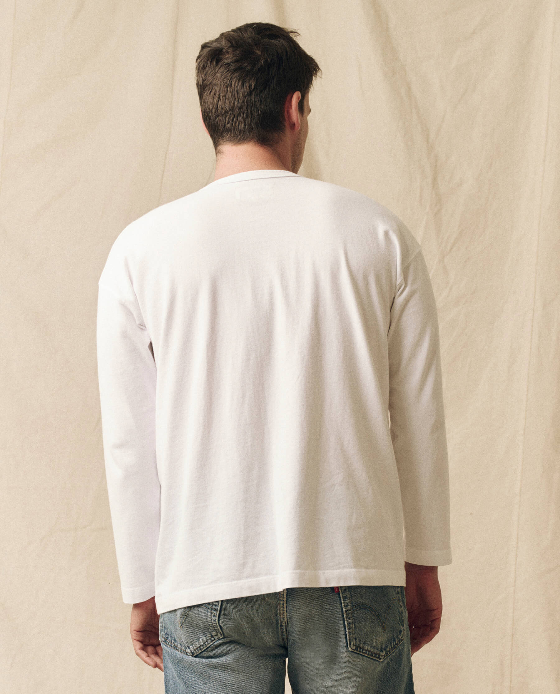 The Men's Pure Knits Long Sleeve Boxy Crew. Solid -- True White TEES THE GREAT. FALL 23 MEN