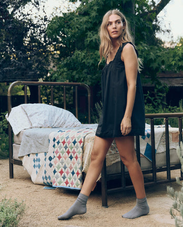 The Eyelet Mini Tank Dress. -- Black – The Great