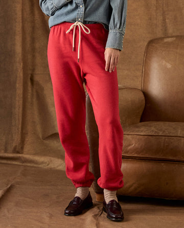 Red The Fleece Stadium Sweatpant -- Campfire sweatpants with a drawstring waist, worn with brown loafers and socks.