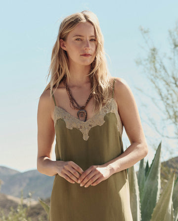 olive green and cream dress A classic beauty with a fresh twist This olive toile midi is perfect for everything from brunch with the girls to evening planstimeless, feminine, and endlessly chic. >> Good Intentions Olive