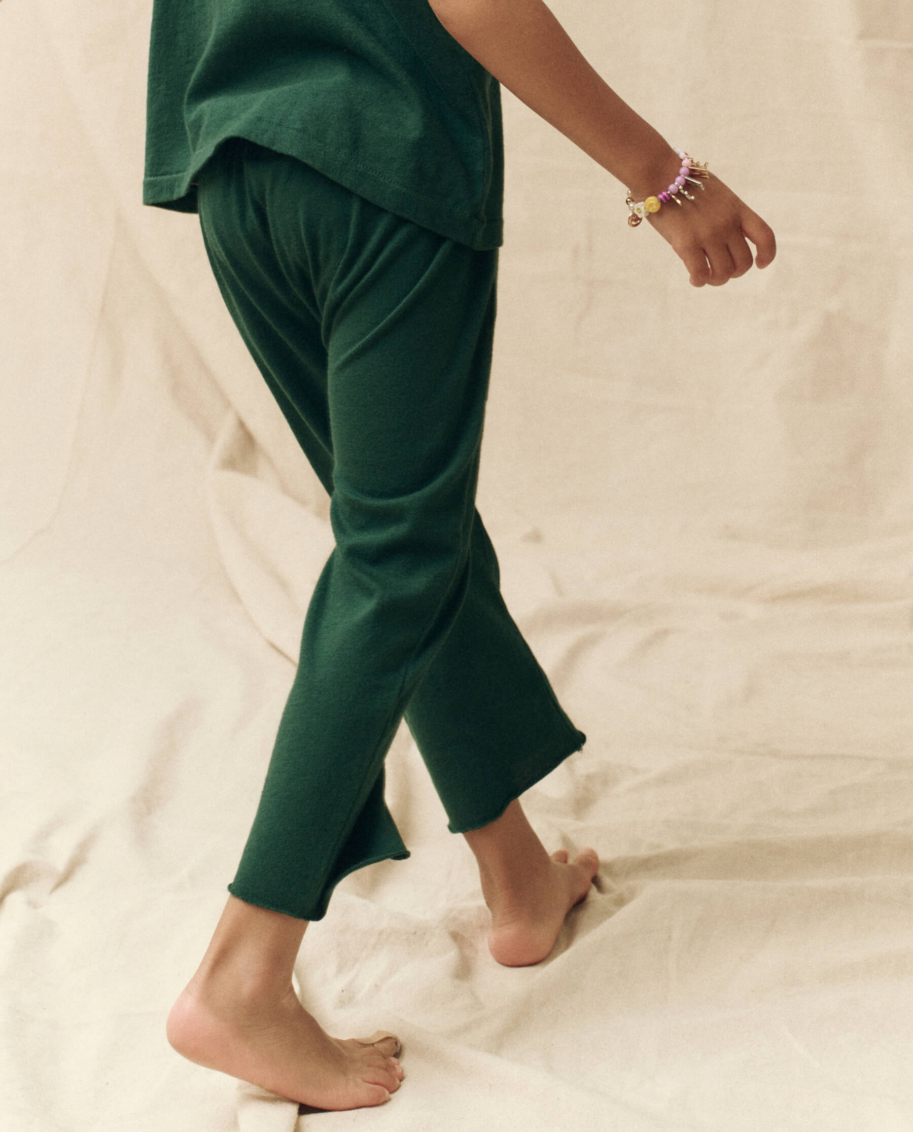 The Little Jersey Crop. Solid -- Green Grove SWEATPANTS THE GREAT. FALL 23 LITTLE