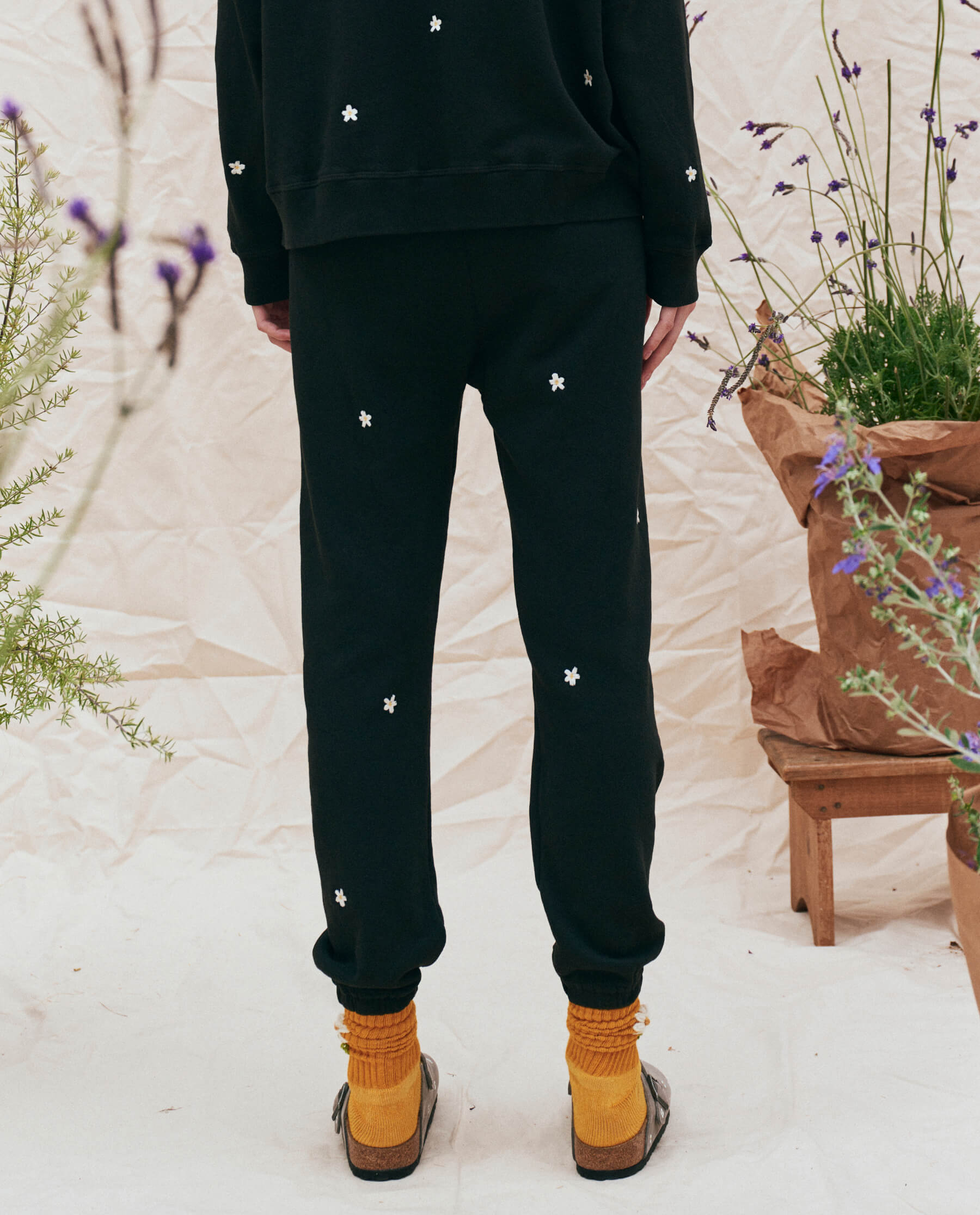 The Stadium Sweatpant. Embroidered -- Almost Black with Cream Flowers