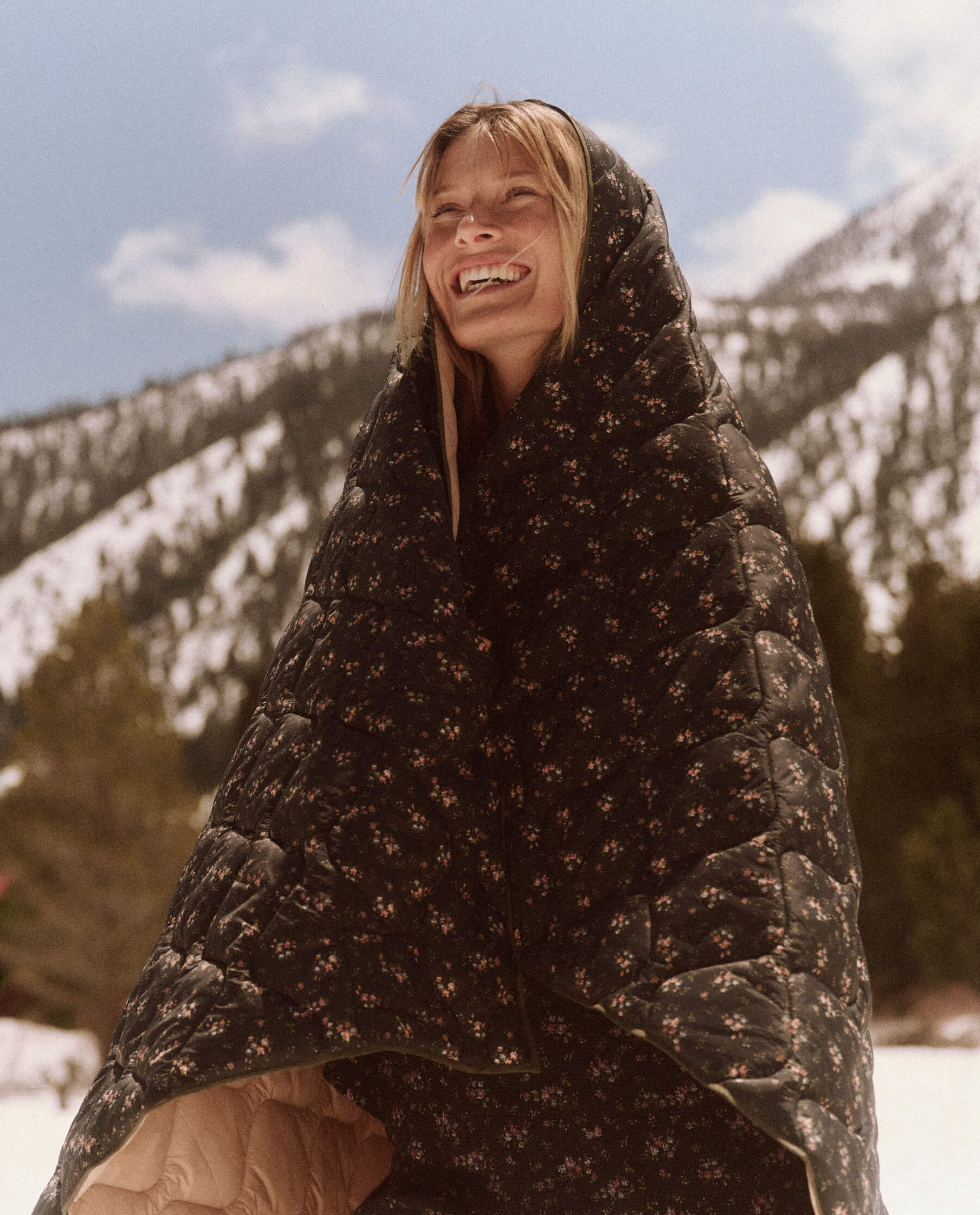The Wearable Reversible Puffer Blanket. -- Wilderness Floral and Powder Pink BLANKETS THE GREAT. FALL 23 TGO SALE