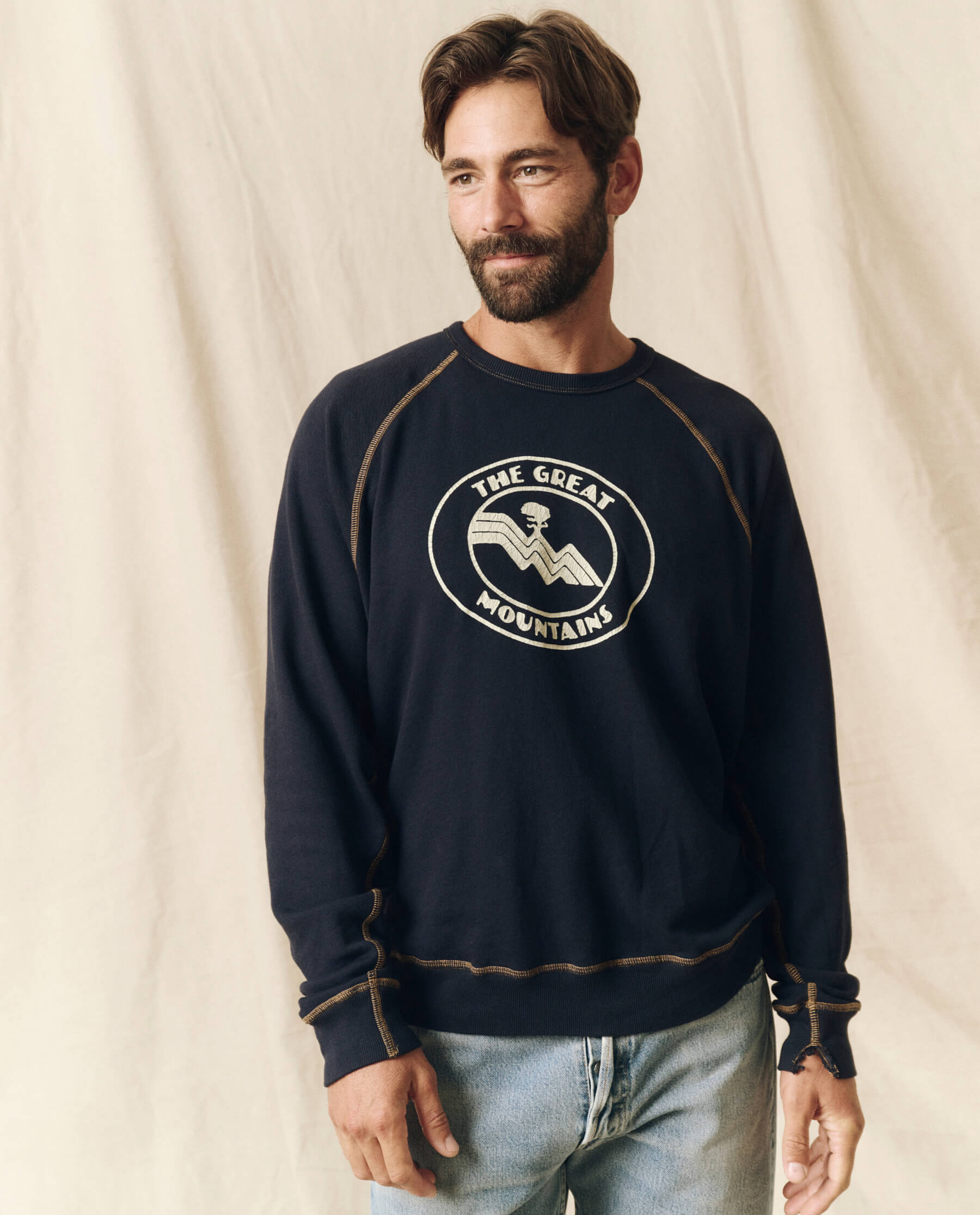 The Men's College Sweatshirt. Graphic -- Stargazer Blue with Mountain Resort Graphic SWEATSHIRTS THE GREAT. SP24 MEN