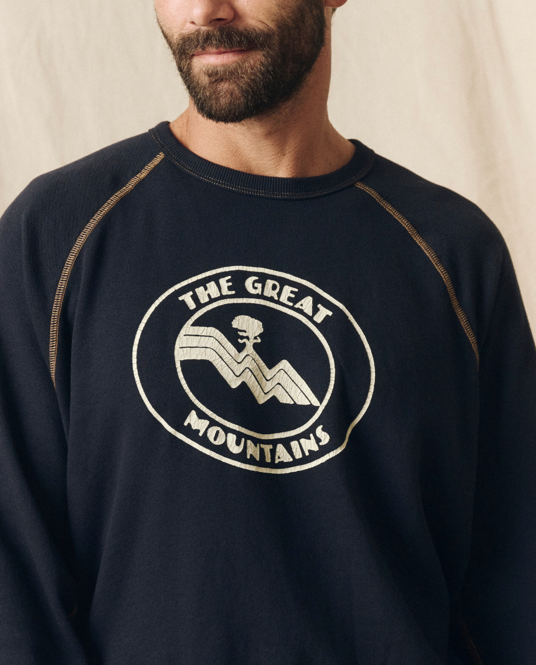 The Men's College Sweatshirt. Graphic -- Stargazer Blue with Mountain Resort Graphic SWEATSHIRTS THE GREAT. SP24 MEN
