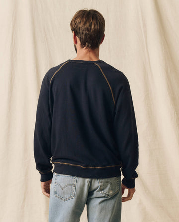 The Men's College Sweatshirt. Graphic -- Stargazer Blue with Mountain Resort Graphic SWEATSHIRTS THE GREAT. SP24 MEN