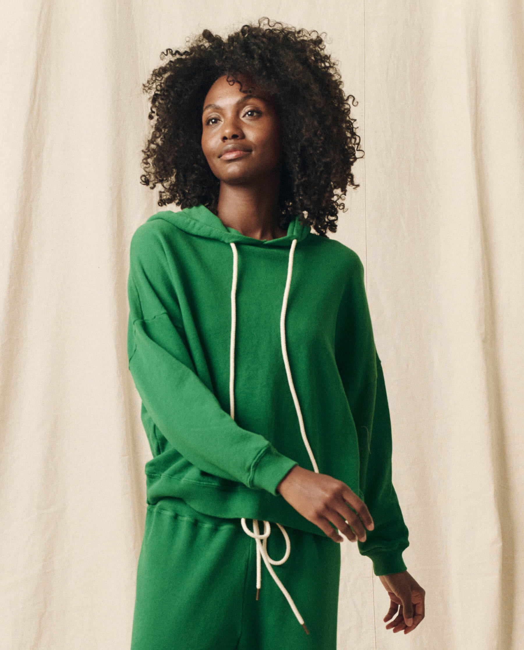 The Teammate Hoodie. Solid -- Holly Leaf SWEATSHIRTS THE GREAT. HOL 23 KNITS
