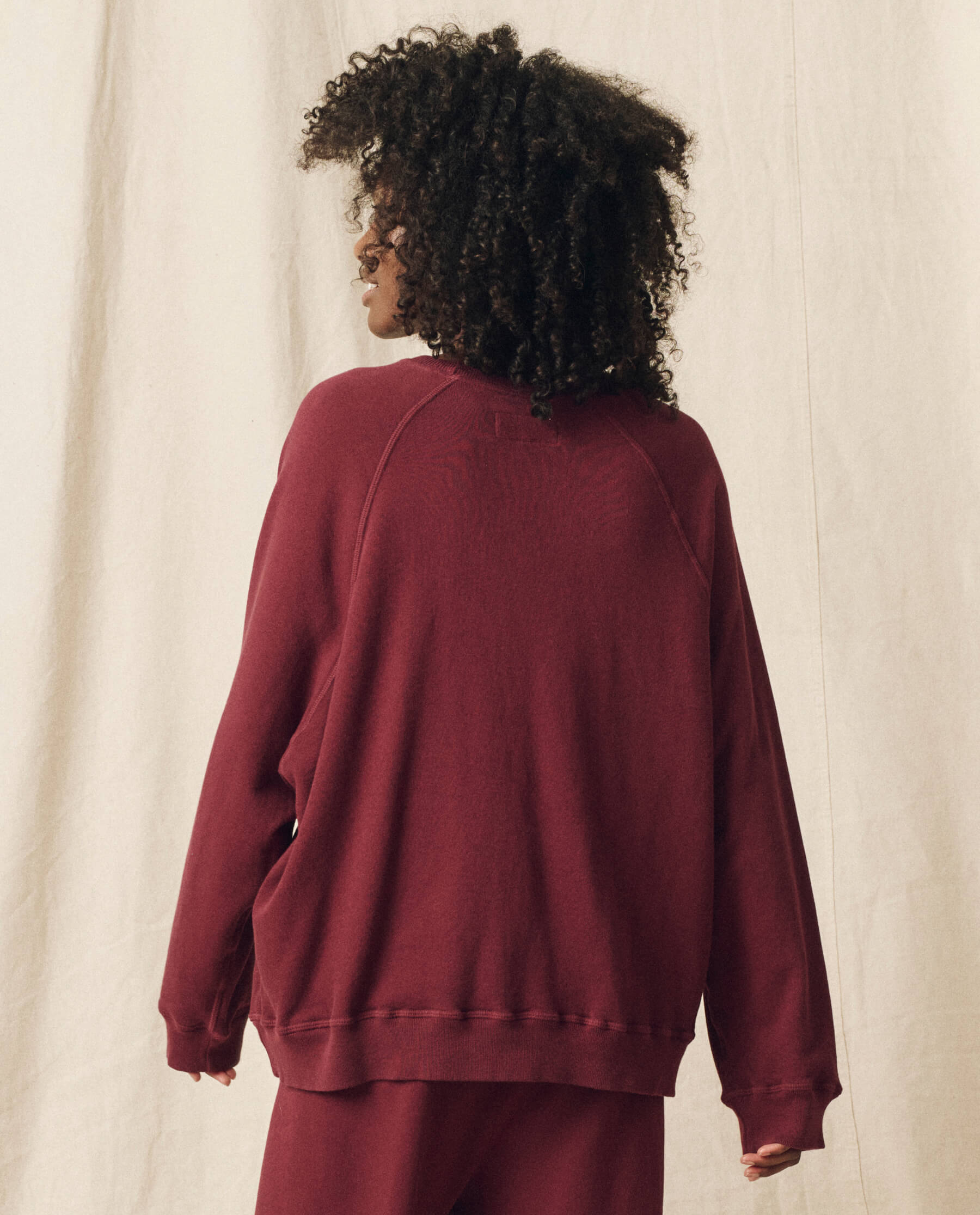 The Slouch Sweatshirt. Solid -- Mulled Wine SWEATSHIRTS THE GREAT. HOL 23 KNITS