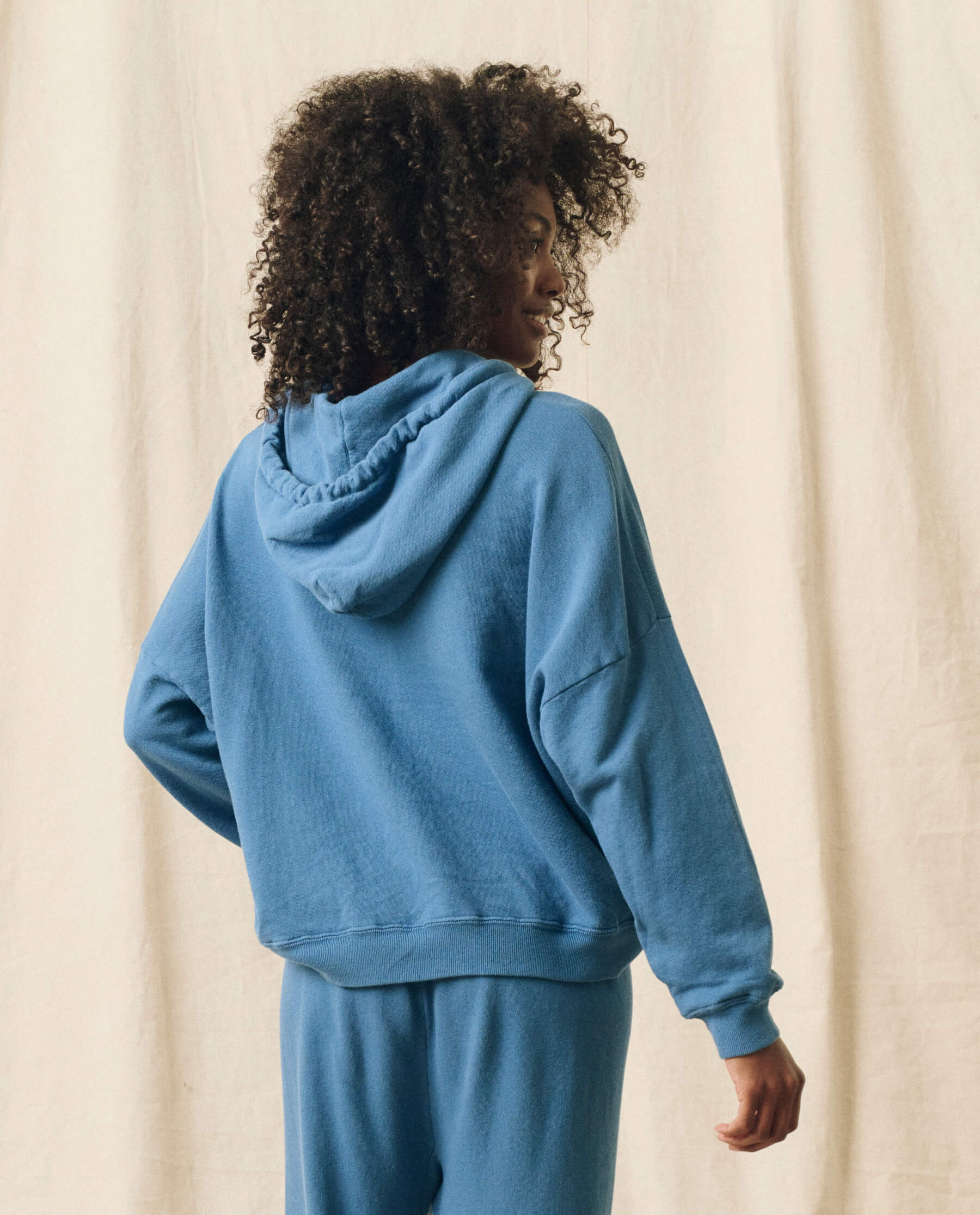 The Teammate Hoodie. Solid -- Glacier Blue SWEATSHIRTS THE GREAT. HOL 23 KNITS