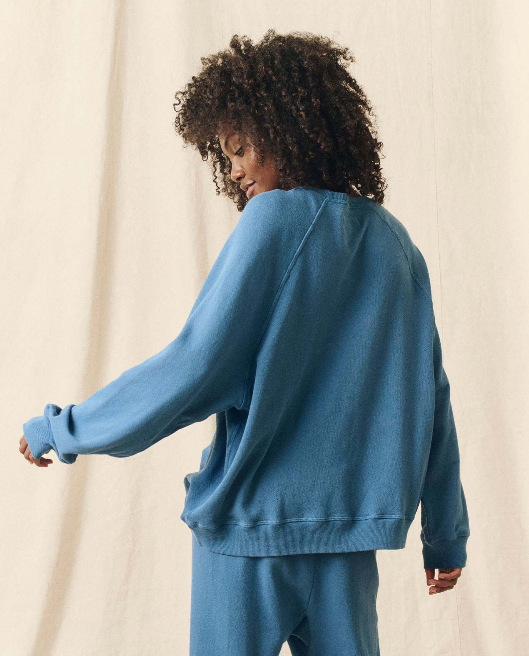 The Slouch Sweatshirt. Solid -- Glacier Blue SWEATSHIRTS THE GREAT. HOL 23 KNITS