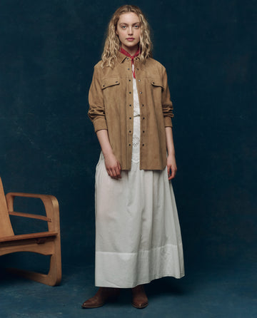 white dress brown jacket Gabrielle Caunesil Pozzoli wears brown wild leather jacket, white... News Photo