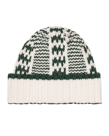 The Chalet Beanie. -- Cream And Forest by THE GREAT. F26 TGO features a white and dark green geometric pattern with a folded white brim, shown on a white background.