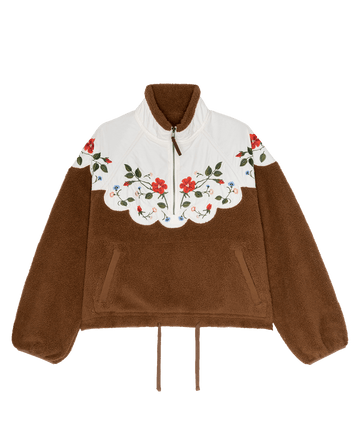 The Plush Wildflower Pullover. -- Chestnut by THE GREAT. F26 TGO: Brown plush with white yoke, floral embroidery, quarter-zip, scalloped edge, front pocket, and drawstring hem.