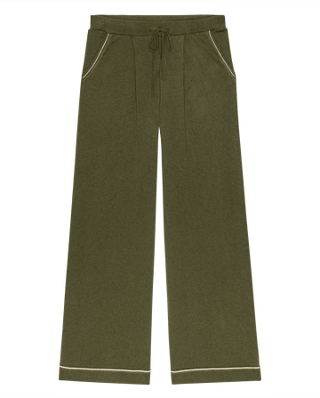 THE GREAT. F26 D1 The Menswear Tipping Trouser Pant in olive, featuring a wide-leg silhouette, drawstring waist, front pleats, and distinctive white piping on the pockets and hems, displayed flat on a white background—a contemporary menswear essential.