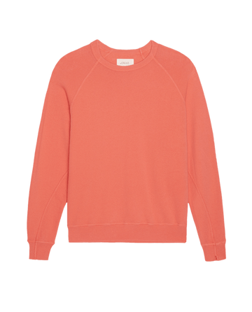 The College Sweatshirt by THE GREAT. SU26 SEASONAL CORE, in solid Guava, is a plain long-sleeve crewneck displayed on a white background.
