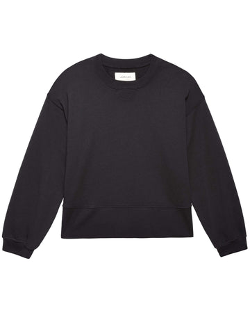 The League Sweatshirt in Almost Black by THE GREAT. PS24 LOFTY KNITS is a handcrafted long-sleeve piece, featuring ribbed cuffs and a crew neckline, made in Los Angeles from comfort-enhancing Lofty loopback French Terry.