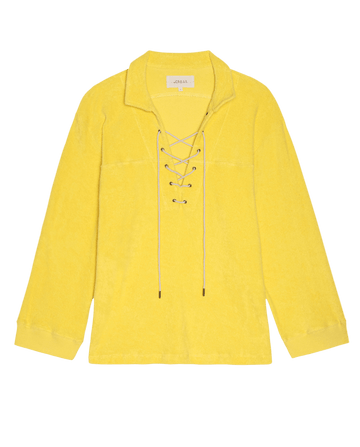 The Micro Terry Lace Up Tunic in Margarita by THE GREAT. SU26, a yellow long-sleeve micro terry collared top with lace-up front detail, is laid flat on a white background.
