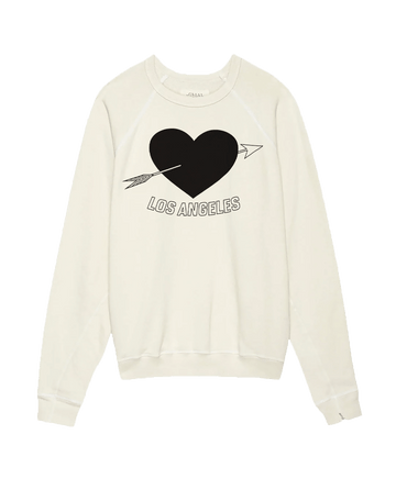 The Men's College Sweatshirt by THE GREAT. SP25 I LOVE LA features a washed white design with an LA heart graphic, depicting a black heart pierced by an arrow and the text "Los Angeles" across it.