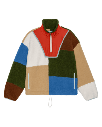 THE GREAT. SP26 TGO "The Plush Color Block Sierra Pullover" in Canyon Multi features red, green, blue, brown, beige, and white colorblock panels with a quarter-zip, high collar, front zipper, and drawstring hem.