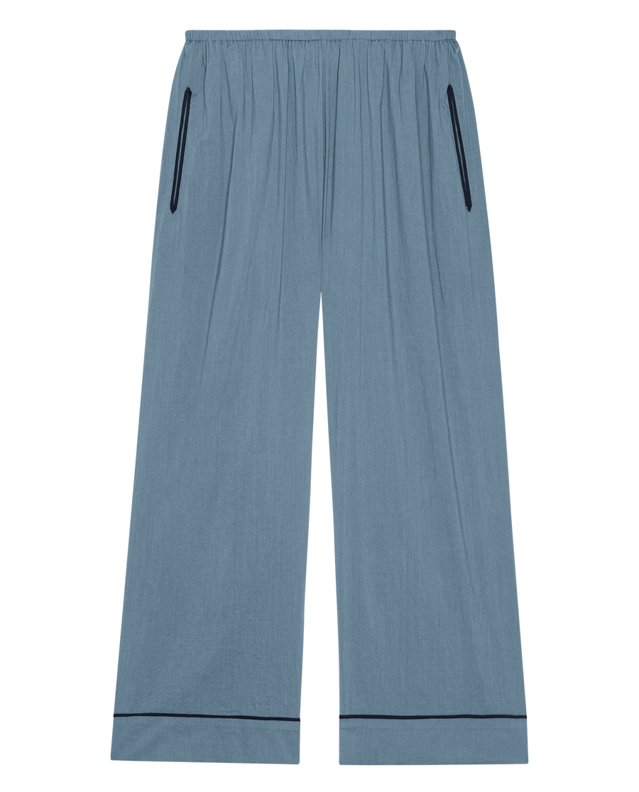 The Western Easy Sleep Pant in Blue Dusk by THE GREAT. SP25 SLEEP features a relaxed wide-leg fit, elastic waistband, black piping on pockets and hems for easy, comfortable wear.